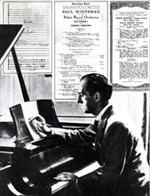 George Gershwin (1898-1937) at work. Artist: Unknown