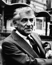 Leonard Bernstein (1918-1990), American composer, outside the Savoy Hotel, London. Artist: Unknown