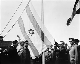 Abba Eban (1915-2002), at the raising of the Israeli flag at UN, 1949. Artist: Unknown