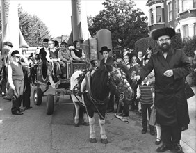 Hasidic street party, Paget Road, London, October 1989. Artist: Sidney Harris
