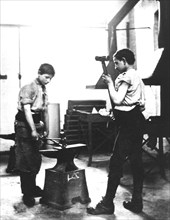 Boys learning blacksmith's skills, Jewish Free School, 1900-1910. Artist: Unknown