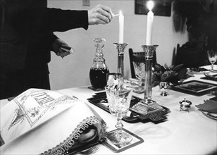 Lighting Shabbat candles, 1985. Artist: Unknown