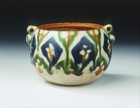 Sancai pottery jar with floral and geometric patterns, Tang dynasty, China, early 8th century. Artist: Unknown