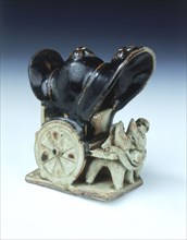 Ox-drawn covered wagon with lady passenger, late Tang dynasty, China, 9th century. Artist: Unknown