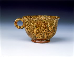 Brown marbleware cup, late Tang dynasty, China, 9th century. Artist: Unknown