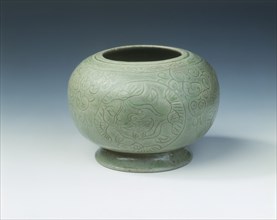 Yue celadon jar with mandarin ducks in lotus medallions, late Tang dynasty, China, 9th-10th century. Artist: Unknown