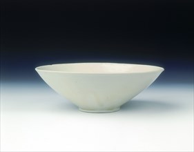 White ware bowl with moulded twin fish and floral pattern, Jin dynasty, China, 12th century. Artist: Unknown
