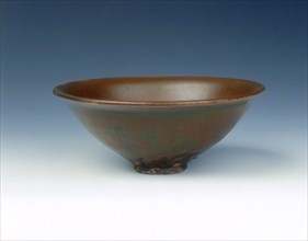 Yaozhou stoneware tea bowl with persimmon red glaze, Jin dynasty, China, 12th century. Artist: Unknown