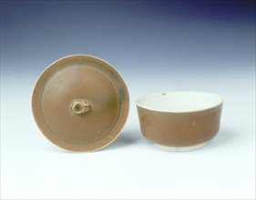 Ding persimmon red glazed covered bowl with white glazed interior, Jin dynasty, China, 12th century. Artist: Unknown