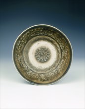 Stoneware bowl with moulded peony scroll and lions, Jin dynasty, China, 13th century. Artist: Unknown