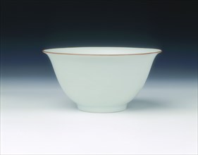 White glazed bowl with moulded design of dragons and carp, Qing dynasty, China, 1650-1670. Artist: Unknown