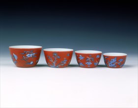 Set of four graduated wine cups on coral ground, Qing dynasty, China, 1700-1722. Artist: Unknown