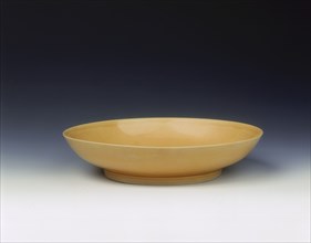 Imperial yellow glazed saucer, Yongzheng period, Qing dynasty, China, 1723-1735. Artist: Unknown