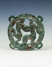 Bronze applique with tigers and boar design, Eastern Zhou dynasty, China, 5th century BC. Artist: Unknown
