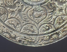 Bronze mirror with dragon and phoenix design, early Six Dynasties period, China, mid 3rd century. Artist: Unknown