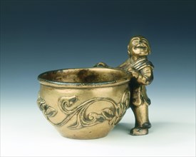 Gilt bronze water container with boy holding the rim, Ming dynasty, China, c early 16th century. Artist: Unknown
