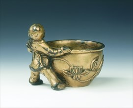 Gilt bronze water container with boy holding the rim, Ming dynasty, China, c early 16th century. Artist: Unknown