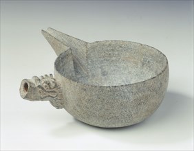 Steatite pouring bowl with dragon head handle, Tang dynasty, China, c618-c906. Artist: Unknown