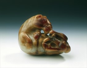 Jade horse with knotted tail biting its rear foot, Tang dynasty, China, 618-907. Artist: Unknown