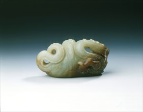 Jade five-clawed dragon with feathered tail in cloth wrapping, late Ming dynasty, China, 1550-1644. Artist: Unknown