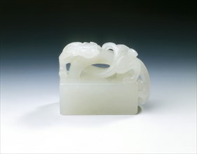 Inscribed white jade seal with arched handle and kui dragon, Ming dynasty, China, 1565. Artist: Unknown
