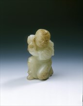 Yellowish jade kneeling tribute bearer, Tang or Liao dynasty, China, 8th-11th century. Artist: Unknown