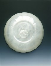 White jade bracketed saucer with two catfish and fungus in relief, Qing dynasty, mid 18th century. Artist: Unknown