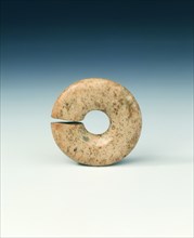 Circular jade bead, neolithic, Chahai type, northern China, c4700-3000 BC. Artist: Unknown