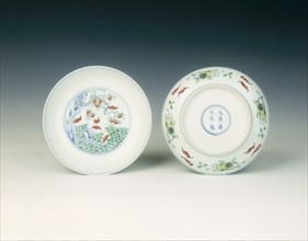 Pair of doucai saucers with bats and peach tree, Qing dynasty, Yongzheng period, 1723-1735. Artist: Unknown
