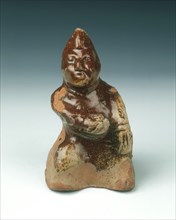 Brown lead glaze pottery dwarf, Eastern Han/Western Jin dynasty, China, 2nd-3rd century. Artist: Unknown