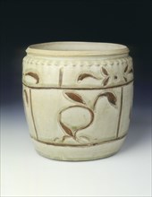 Celadon jar with floral decoration in brown slip, Thanh-hoa type, Ly dynasty, Vietnam, 12th century. Artist: Unknown