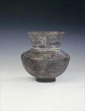Ban Chiang burnished black pottery jar, Thailand, c1000-500 BC. Artist: Unknown