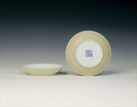 Pair of rice yellow-backed saucers, Qing dynasty, Jiaqing period, China, 1796-1820. Artist: Unknown