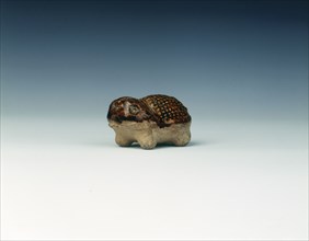 Brown pottery toad-like animal, Tang dynasty, China, 618-907 AD. Artist: Unknown