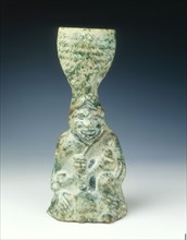 Candlestick of a human figure with infant, Eastern Han dynasty, 25 AD-220 AD. Artist: Unknown