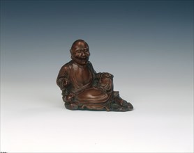 Reclining boxwood luohan figure, Qing dynasty, China, 18th century. Artist: Unknown