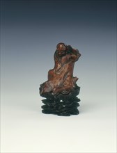 Wood figure of a luohan wrapped in a tree, late Ming dynasty, China, 1600-1644. Artist: Unknown