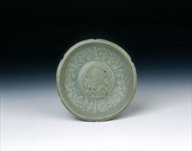 Celadon lobed saucer with moulded floral decoration of Liao type, Koryo dynasty, Korea, c1120-1130. Artist: Unknown