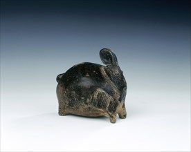 Brown glazed rabbit-shaped stoneware lime pot, Cambodia, 12th-14th century. Artist: Unknown