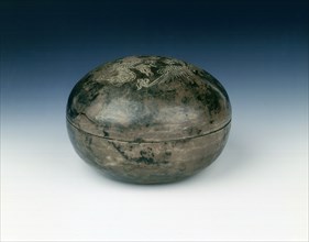Round silver box with two incised phoenixes, Yuan dynasty, China, 1279-1368. Artist: Unknown