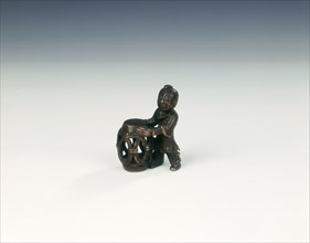 Bronze group of boy with openwork barrel garden seat, Late Ming dynasty, China, 1550-1644. Artist: Unknown