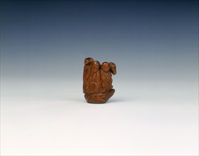 Wooden toggle of a monk, monkey, pig and horse on the back of a turtle, China, 17th century. Artist: Unknown