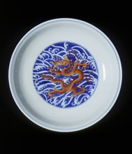 Dish with red imperial dragon, Qianlong period, Qing dynasty, China, 1736-1795. Artist: Unknown