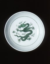 Green imperial dragon dish with anhua waves, Kangxi period, Qing dynasty, China, 1662-1722. Artist: Unknown