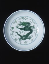 Green glazed imperial dragon dish, Qianlong period, Qing dynasty, China, 1736-1795. Artist: Unknown