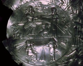 A Sassanid silver dish showing the investiture of a King. Artist: Unknown
