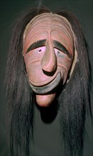 Iroquois false-face mask which belonged to a member of the 'False Face Band'. Artist: Unknown