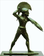 A bronze statuette of a Greek hoplite warrior. Artist: Unknown