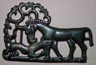 Chinese third century BC bronze plaque, depicting an animal attacking a horse. Artist: Unknown