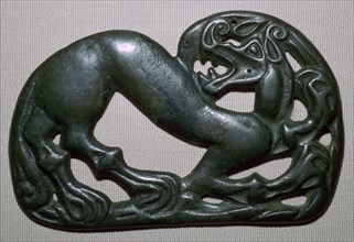 Chinese fourth century BC bronze plaque, depicting a tiger. Artist: Unknown